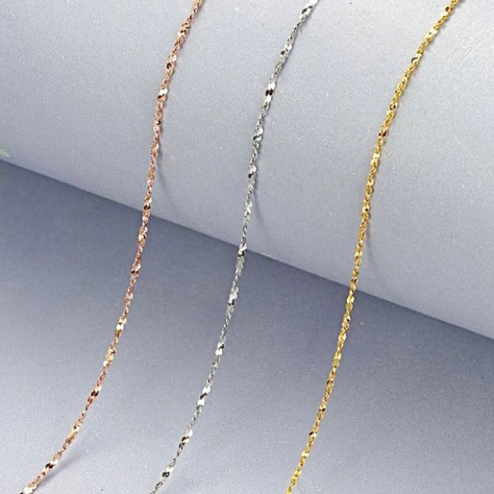 Simple, yet tasteful. Thin enough to layer or wear alone.